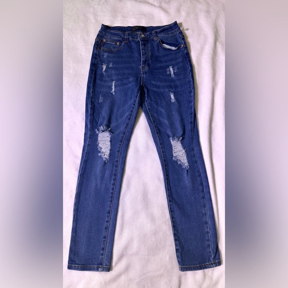 Women’s Distressed Blue Skinny Jeans